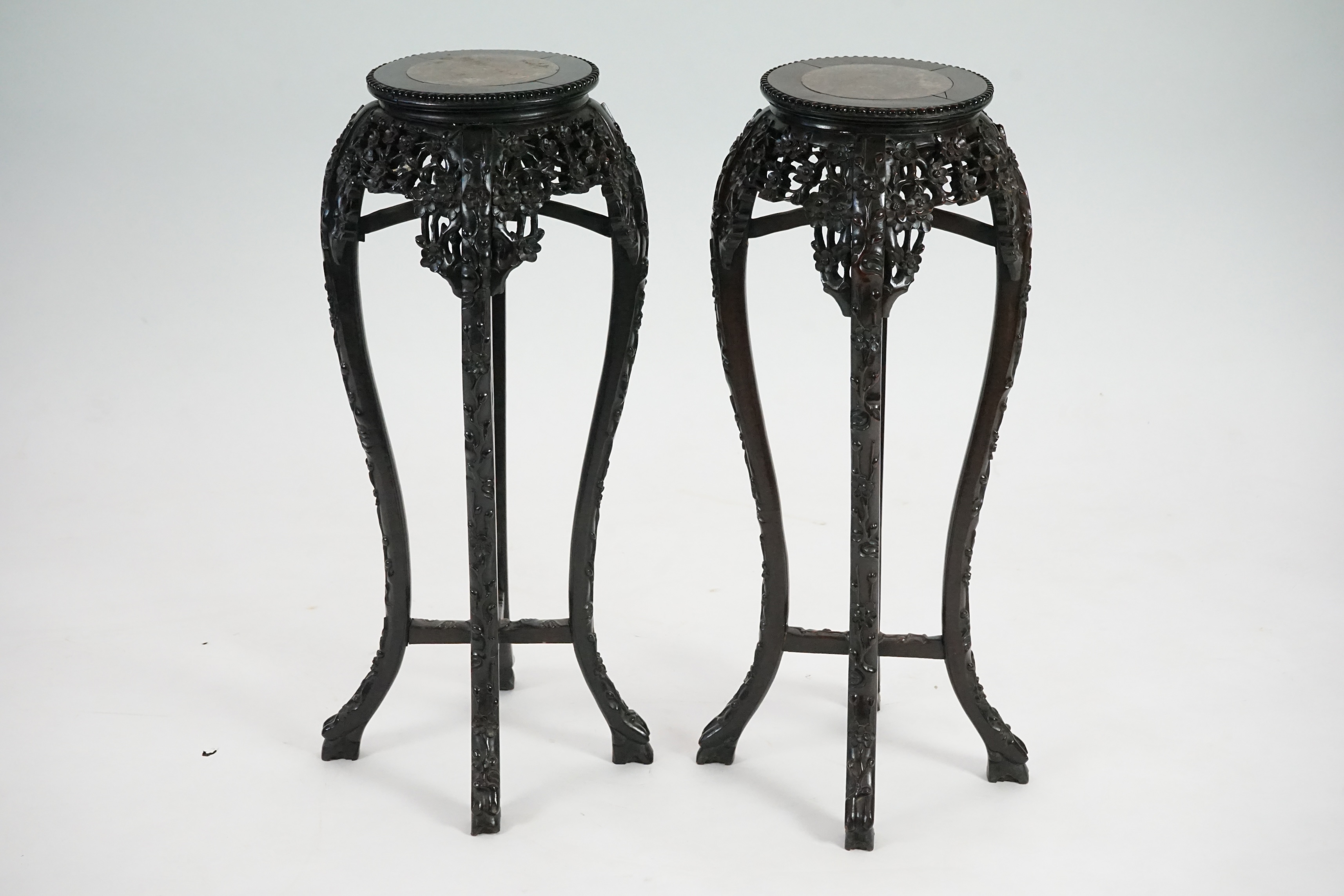 A pair of late 19th century Chinese hongmu and marble inset vase stands, height 91cm. Condition - fair to good